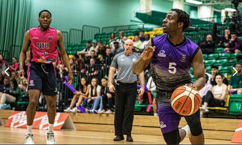 Ade playing for the University of Herts